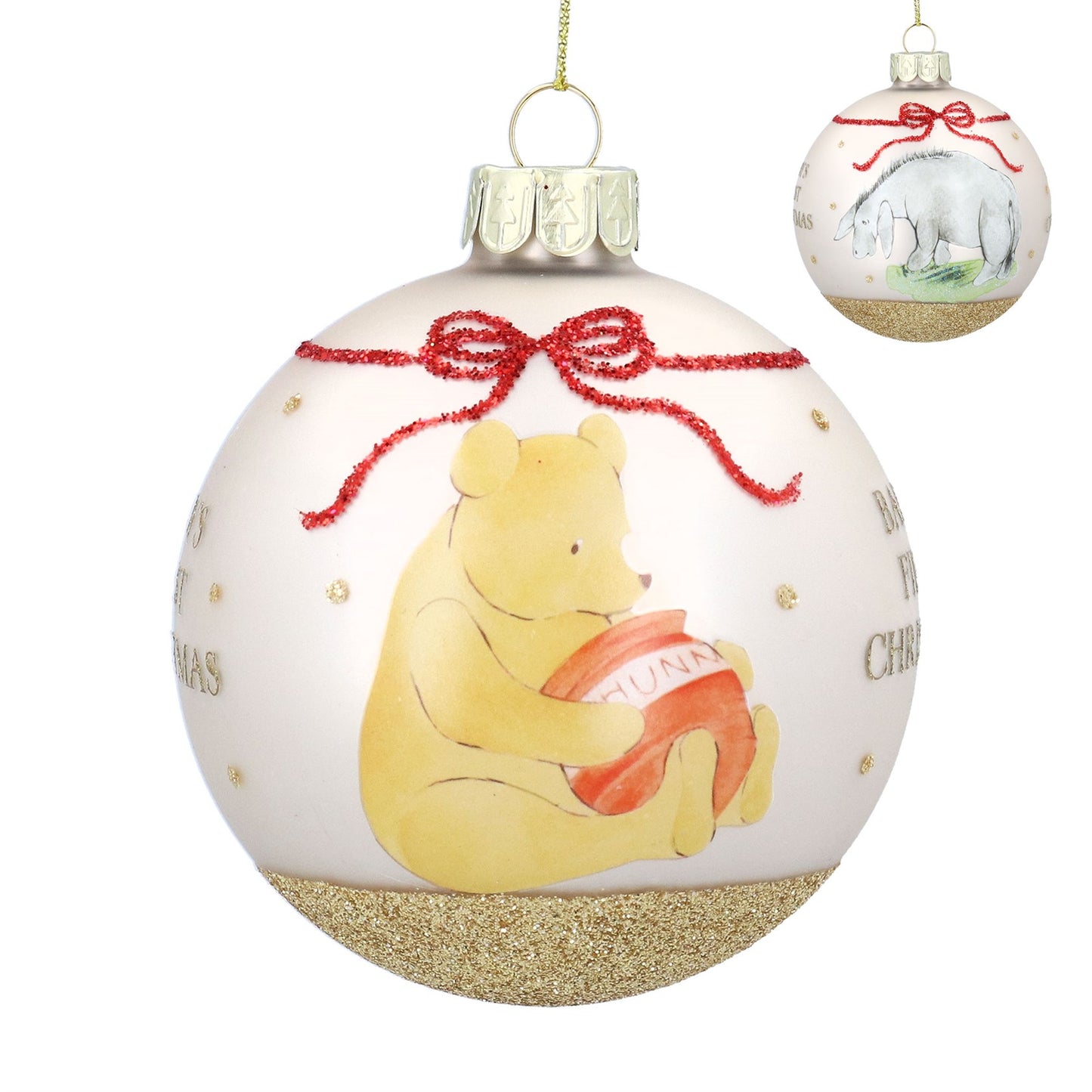 Christmas bauble with Winnie the pooh and Eeyore red glitter bow and text of Baby's First Christmas on a white background.