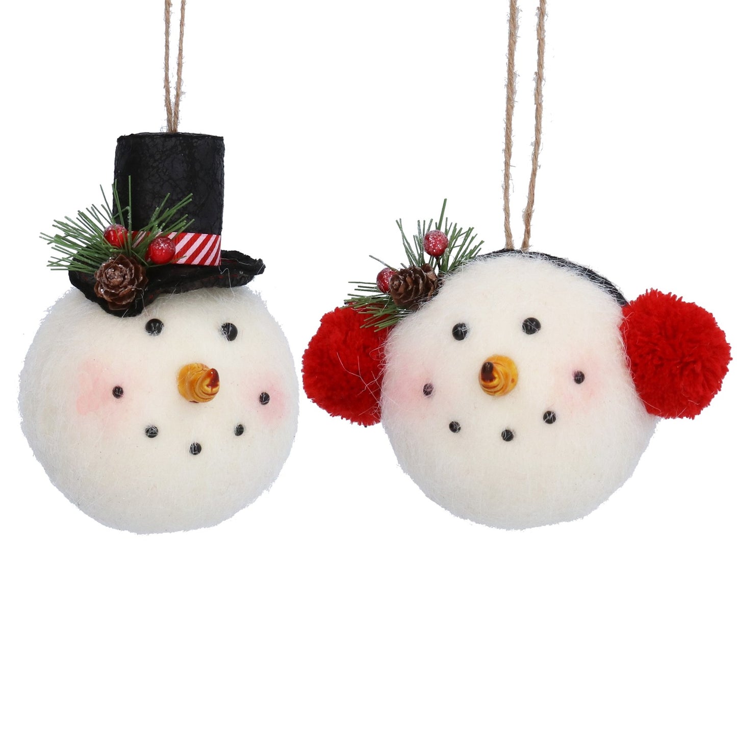Two white fluffy snowman ornaments hanging side by side on a white background. One has a black top hat with green pine branches, red berries, and a striped candy cane, while the other has red pom-pom ears and a small pinecone decoration.