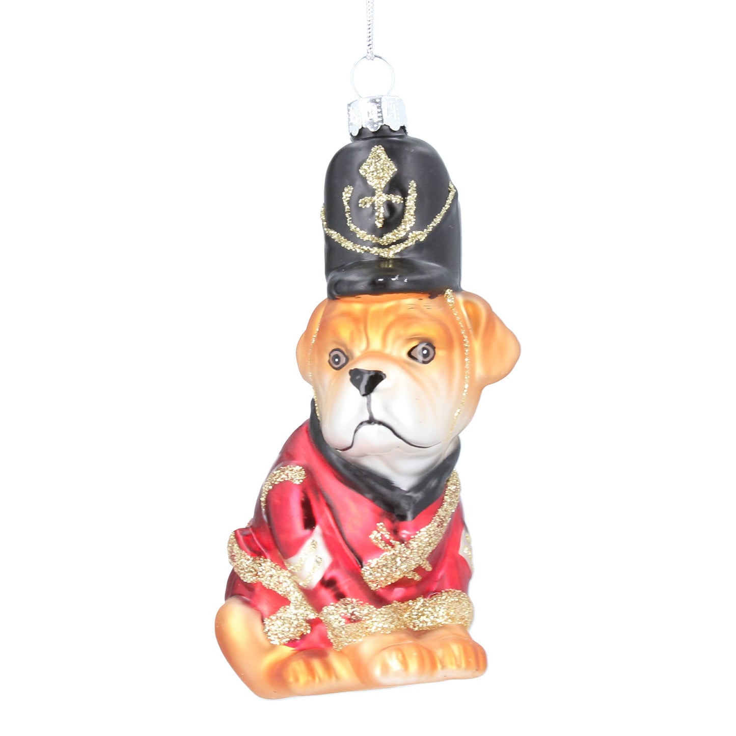 A glass Christmas ornament shaped like a bulldog dressed as a military officer, wearing a black peaked cap with gold detailing and a red uniform with gold trim, shown on a white background.