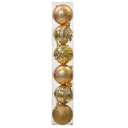 Pack of gold Christmas ornaments in a clear tube on a white background
