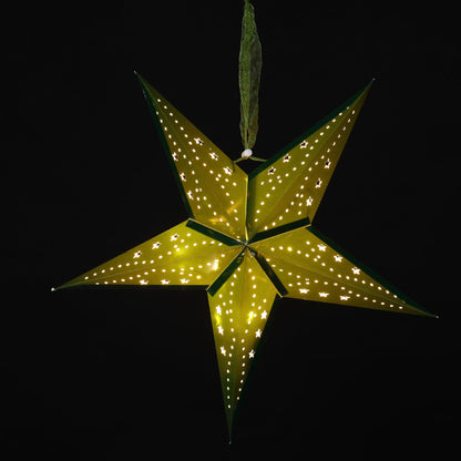 A glowing five-pointed star ornament with small illuminated dots along its edges and a hanging loop at the top, shown against a solid black background.