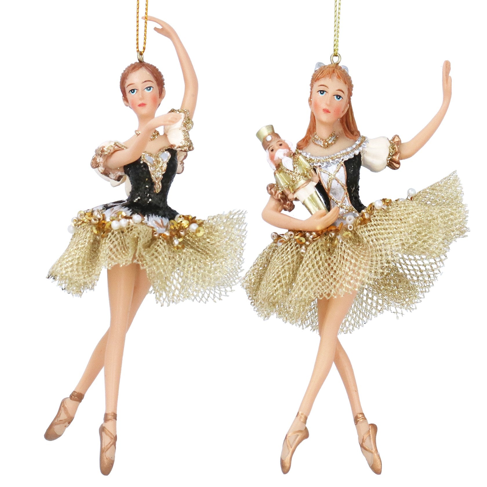 Two decorative ballerina figurines in gold and black costumes on a white background