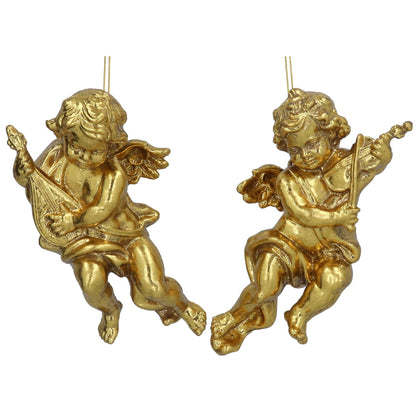 Two gold cherub figurines with lyres on a white background