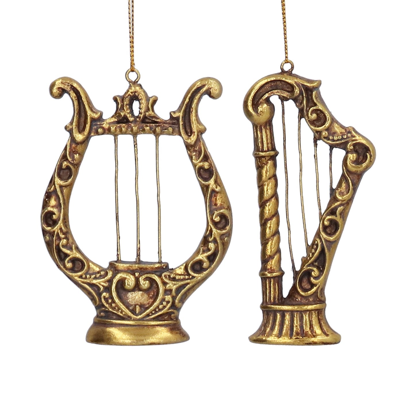 ornate gold harp and lyre shaped decorations on a white background