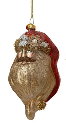 Decorative glass ornament shaped like a bearded face with red hair, gold beard, and decorative headpiece.