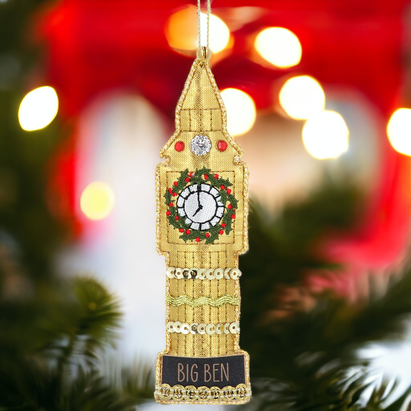A fabric hanging Christmas tree decoration featuring a replica of the London Big Ben clock tower with a festive design.