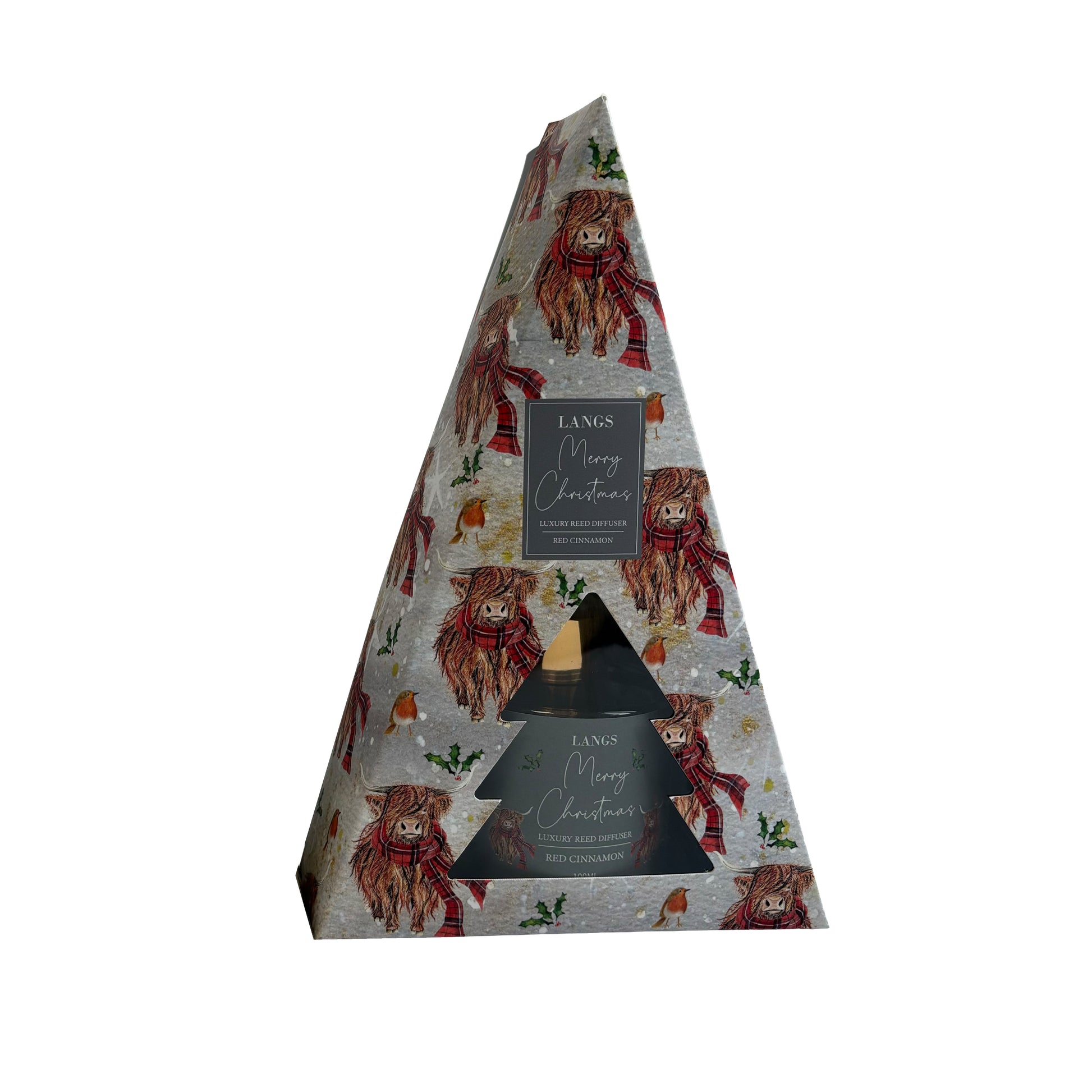 A triangular gift box for a Langs Merry Christmas diffuser, featuring a pattern of Scottish highland cows in red scarves on a white background with silver glitter. The box has two triangular cutouts showing the glass diffuser inside, and a central label reading 'Langs Merry Christmas'.