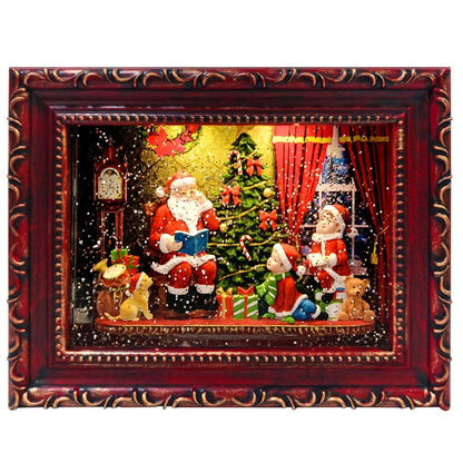 A picture frame water spinner Christmas scene with an ornate dark red and gold frame. The artwork shows Santa Claus, a Christmas tree, gifts, snow, and festive decorations against a black background.