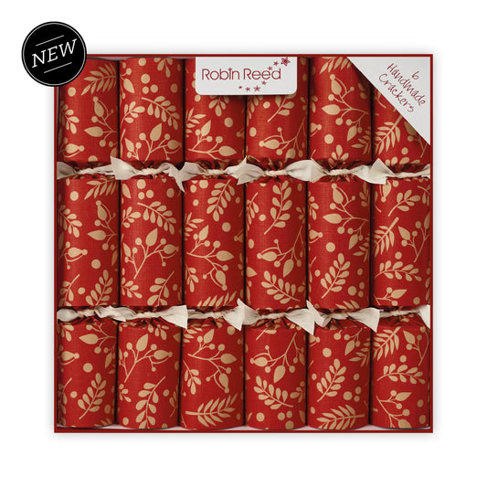 Box of red cracker boxes with gold leaf pattern, featuring 'Robin Reed' brand.