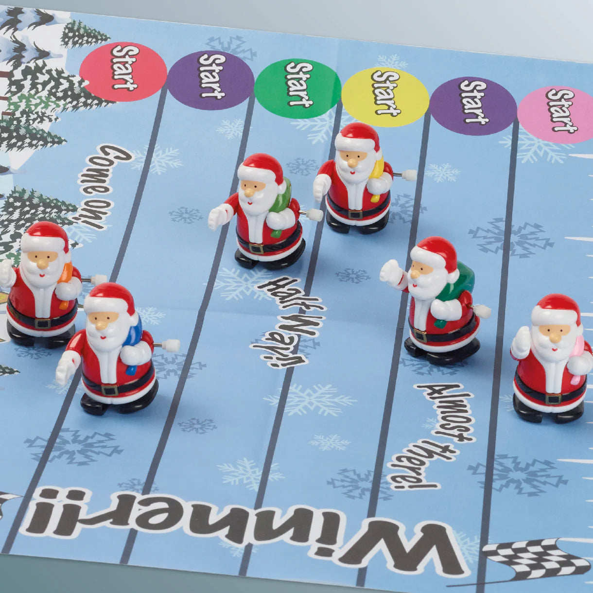 Board game with Santa Claus figures on a blue background