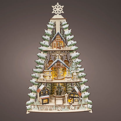 Decorative Christmas tree with houses and lights on a gray background