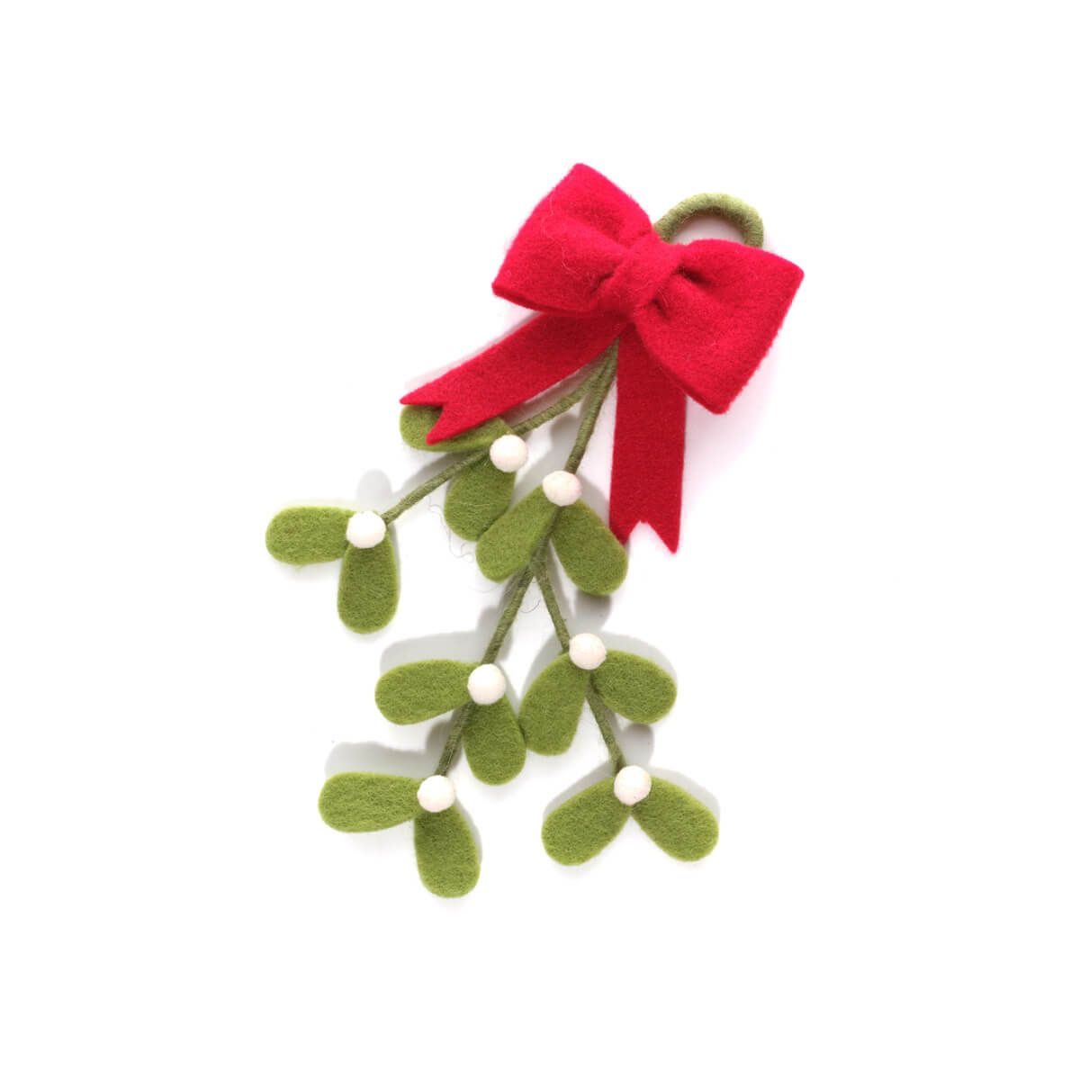 A felt Christmas mistletoe decoration with green leaves, small white berries, and a red felt bow, shown on a plain white background.