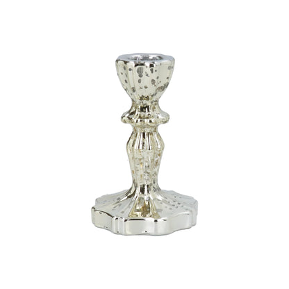 Gold crackle effect candle holder on a white background