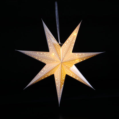 Star-shaped 3D paper lantern with a warm glow on a black background