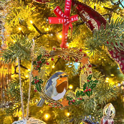 Decorative Christmas ornament with a bird design on a tree