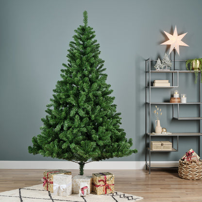A 6ft tall artificial Christmas tree with green PVC foliage, placed in a home setting with decorative items and a star-shaped light hanging on the wall in the background.