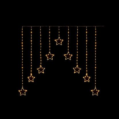 Warm white LED star-shaped hanging string lights suspended from a horizontal wire against a solid black background.