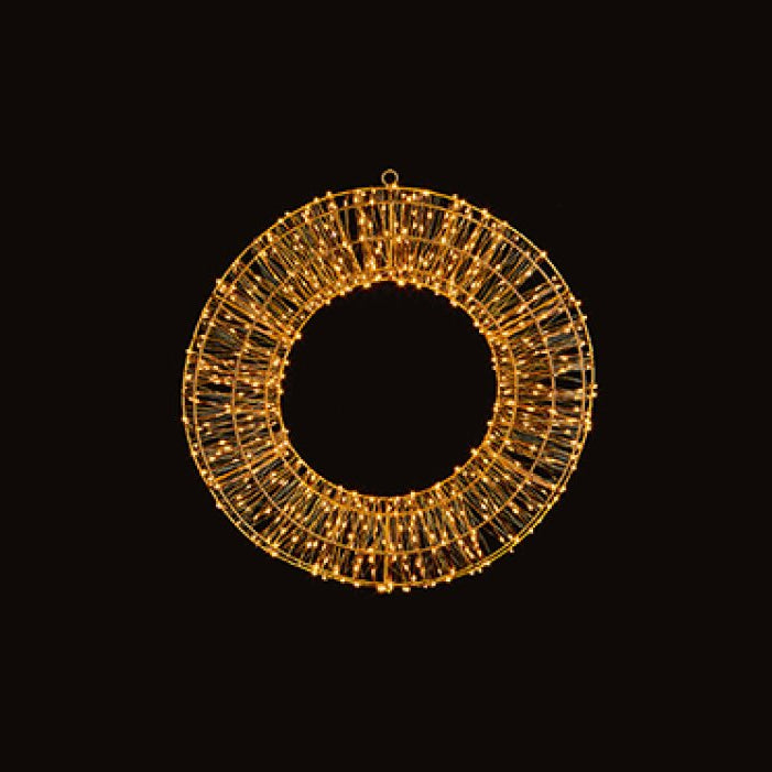 Decorative wreath with gold lights on a black background