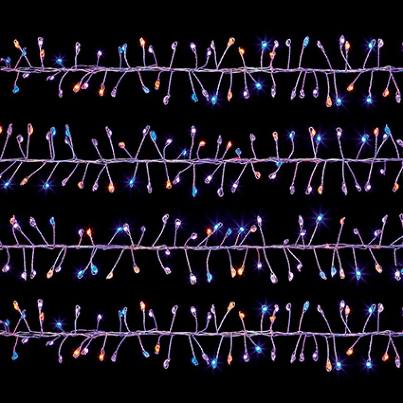 Multicolor Christmas tree string lights with purple wire and glowing blue, orange, and purple bulbs, shown against a solid black background.
