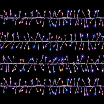 Multicolor Christmas tree string lights with purple wire and glowing blue, orange, and purple bulbs, shown against a solid black background.