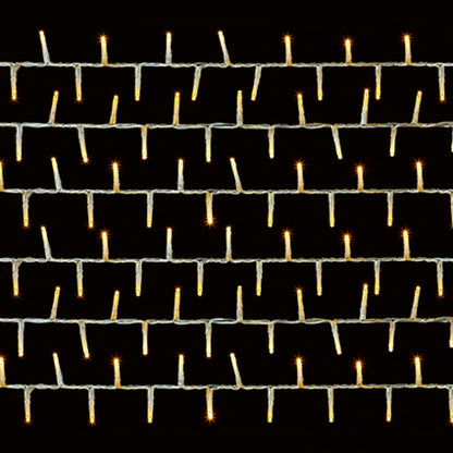 Warm white string lights on clear cable arranged in horizontal rows on a black background.
