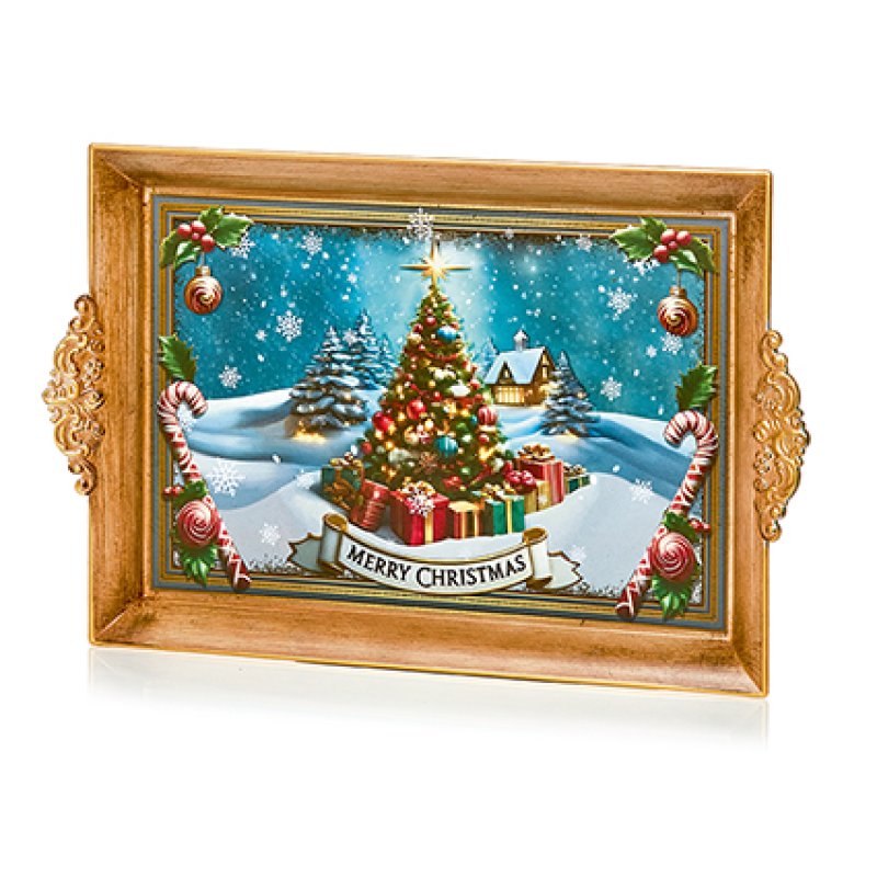 A rectangular decorative tray with ornate gold-toned handles and a festive Christmas scene printed on the insert. The design shows a snow-covered landscape, a lit Christmas tree, wrapped gifts, candy canes, holly, and a banner reading “Merry Christmas.