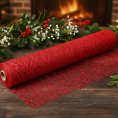 A roll of red glittery fabric or craft material partially unrolled to show its textured, speckled surface, set against a plain white background.