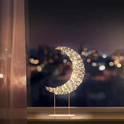 Decorative moon lamp on a stand with a cityscape in the background