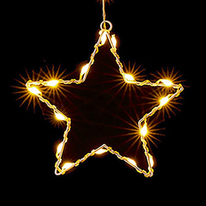 A glowing star-shaped string light ornament with warm white lights on a black background.