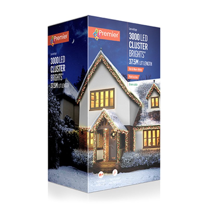 A product box for Premier 3000 LED cluster lights, featuring a snowy house illustration with warm yellow window lights and decorative string lights on the front and side panels.