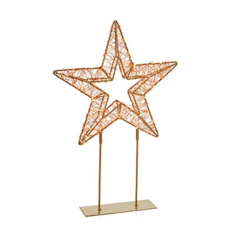 Decorative star-shaped lamp with a stand on a white background