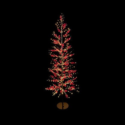 A tall, slender artificial Christmas tree with warm white lights and red berry-like accents, mounted on a small round base against a solid black background.