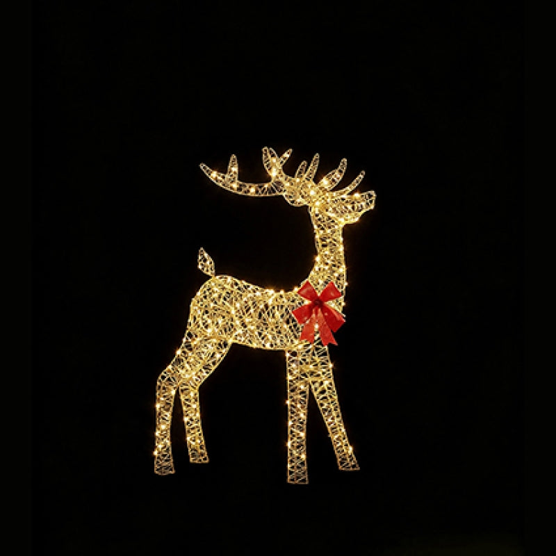 A glowing wire-frame reindeer decoration with warm yellow lights and a red bow around the neck, shown against a solid black background.