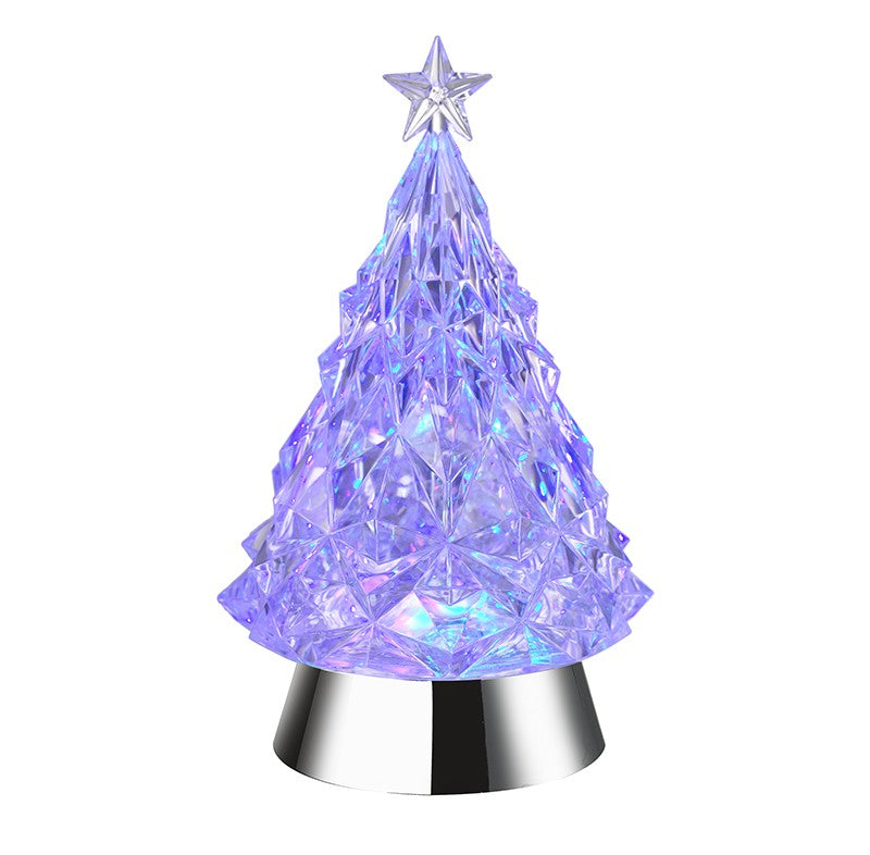 Crystal Christmas tree with a star on top on a white background