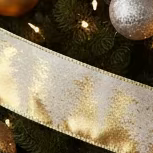 A length of white and gold Christmas tree design ribbon, 5m in length and 6cm in width, with a Christmas tree pattern.