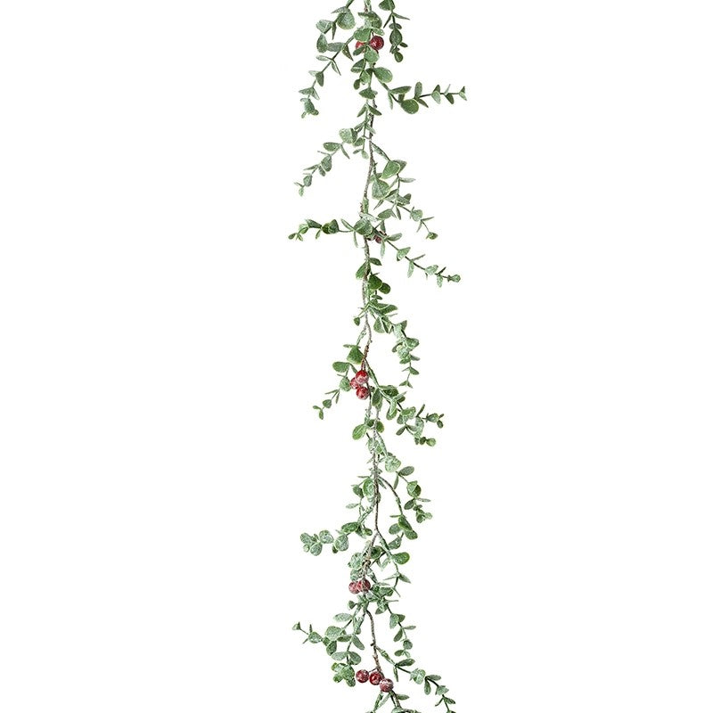 A garland of green leaves and red berries, likely intended for Christmas decoration.
