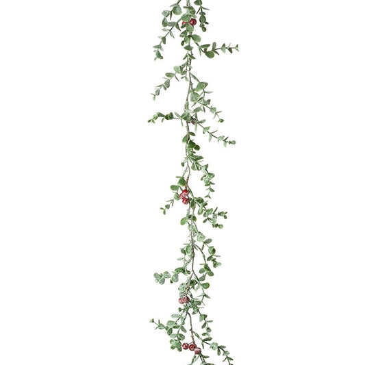 A garland of green leaves and red berries, likely intended for Christmas decoration.