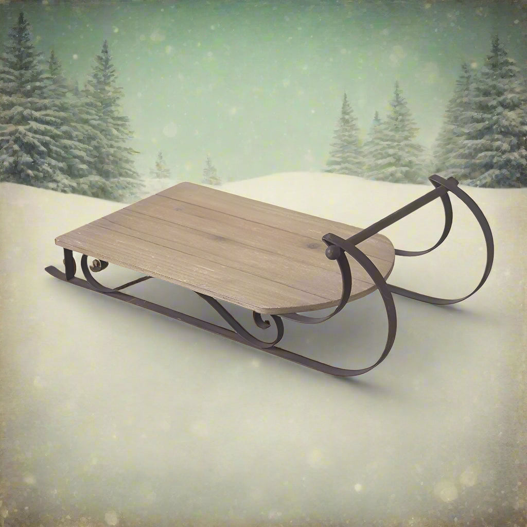 A wooden sledge decoration with a metal frame, designed as a festive display, cheeseboard, wall decoration
