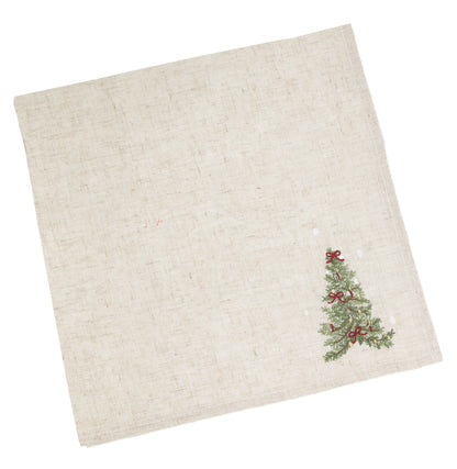 An off-white linen napkin featuring a small embroidered Christmas tree with green needles and red bows in the bottom right corner, shown on a plain white background.