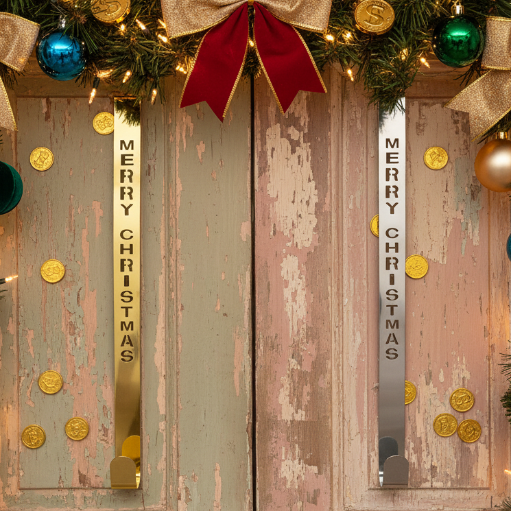 Decorative Christmas door with wreaths, ornaments, and 'Merry Christmas' banners.