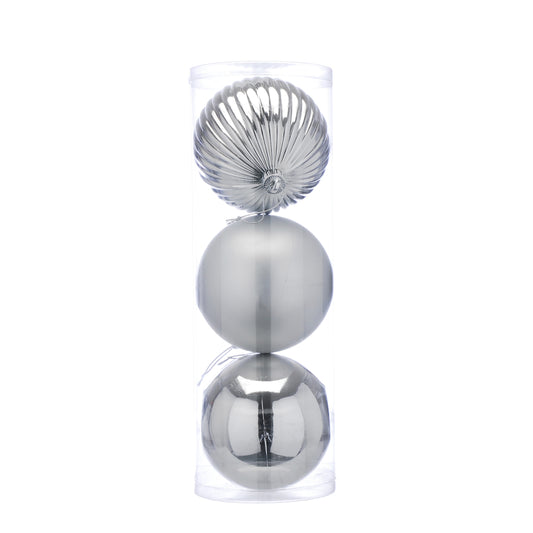 Set of three metallic spheres stacked on a white background