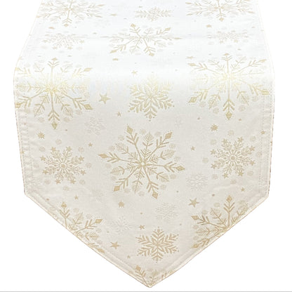 Champagne table runner with gold snowflake pattern on a white background
