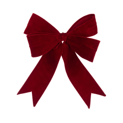 Red velvet bow on a white background