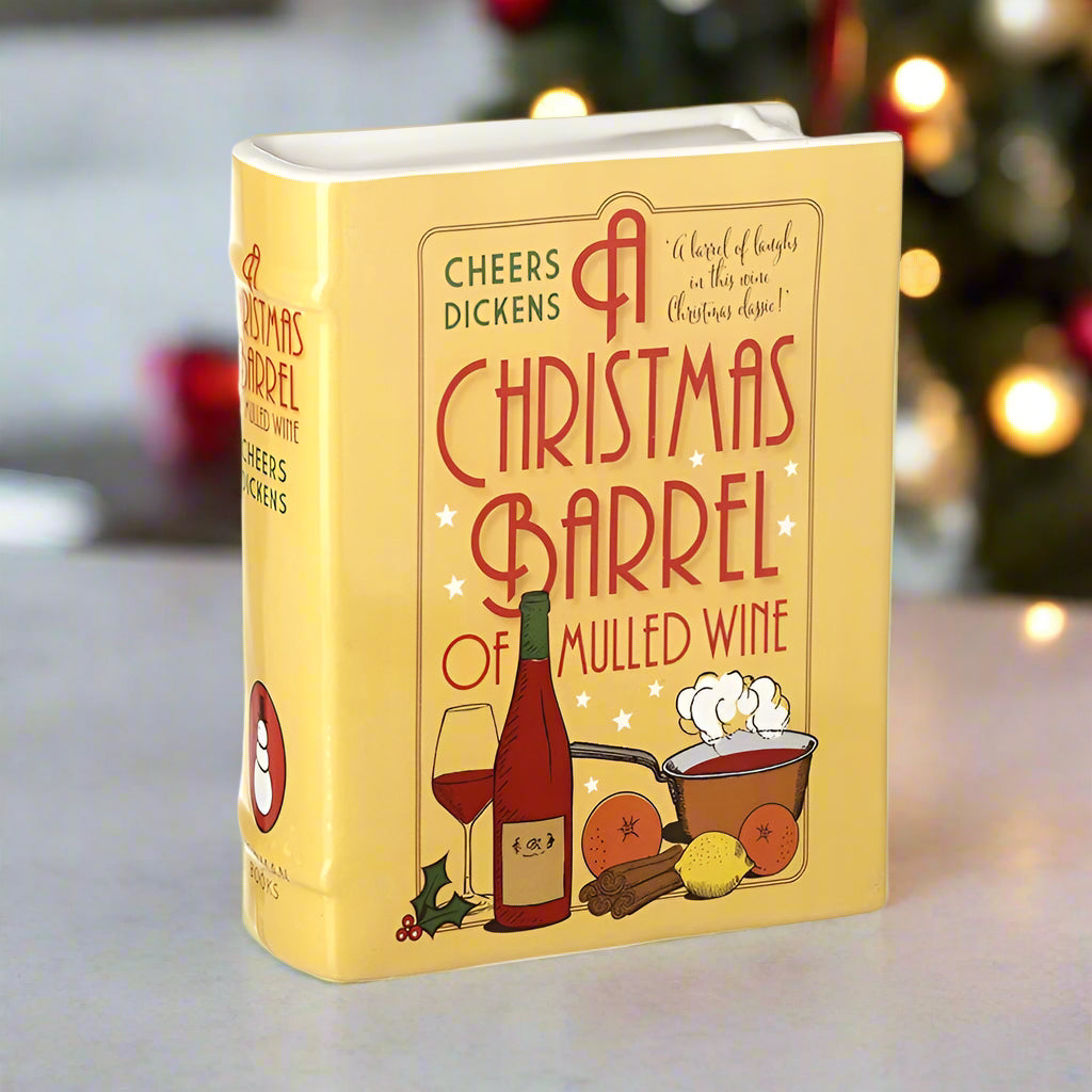 Yellow ceramic box with 'A Christmas Barrel of Mulled Wine' design, featuring a bottle and glass illustration.