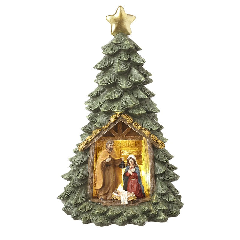 A resin Christmas nativity scene figurine shaped like a pine tree, featuring a gold star on top, a glowing stable with Mary, Joseph, and baby Jesus, and a small white sheep at the base, shown against a plain white background.