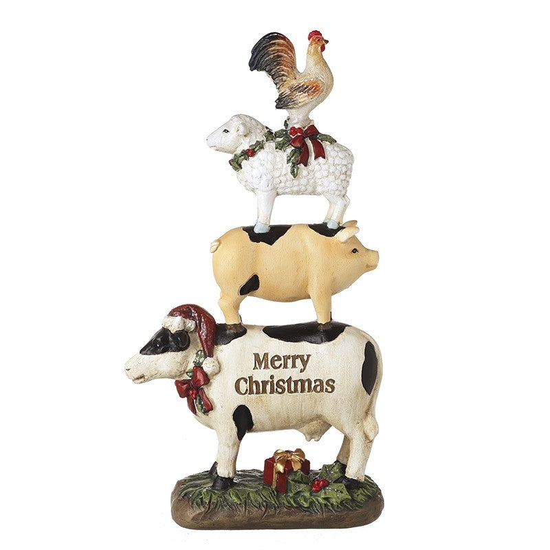 Stack of Christmas-themed animal figurines including a cow, pig, sheep, and rooster on a white background.