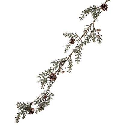Decorative branch with pine cones on a white background