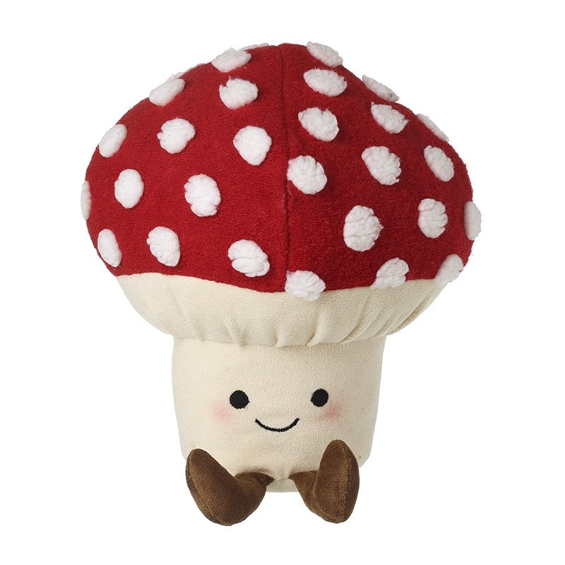 Plush door stop mushroom with a red polka dot cap on a white background