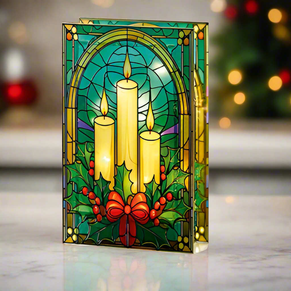 Stained glass-style Christmas card with candles and holly on a blurred background