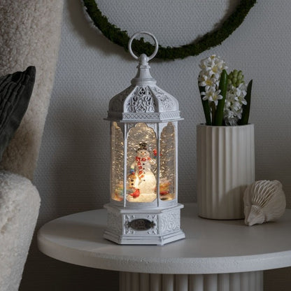 Konstsmide Antique White Snowman Scene Christmas Water Lantern with Bluetooth Speaker